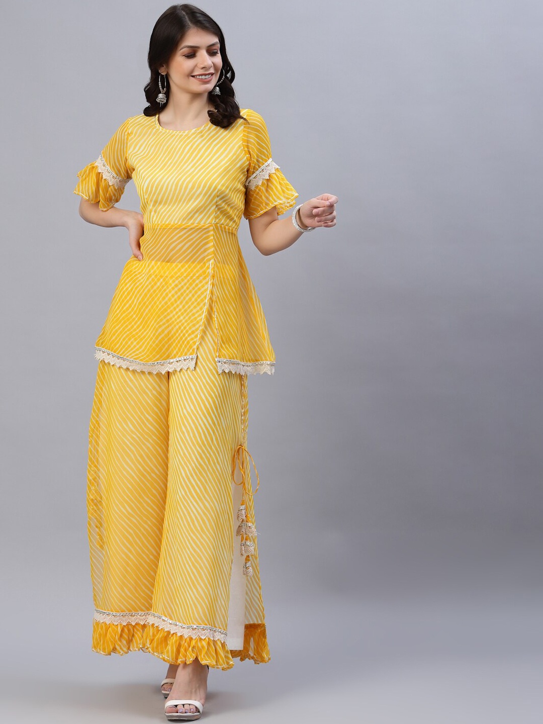 

Ragavi Women Yellow Striped Empire Kurti with Trousers