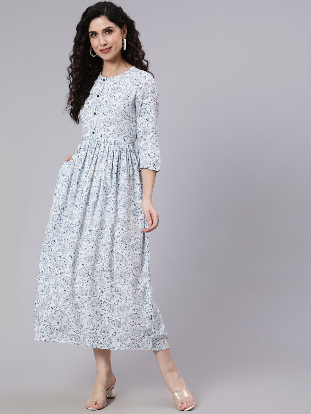 

Nayo White Floral Ethnic Printed Flared With Round Neck Midi Dress
