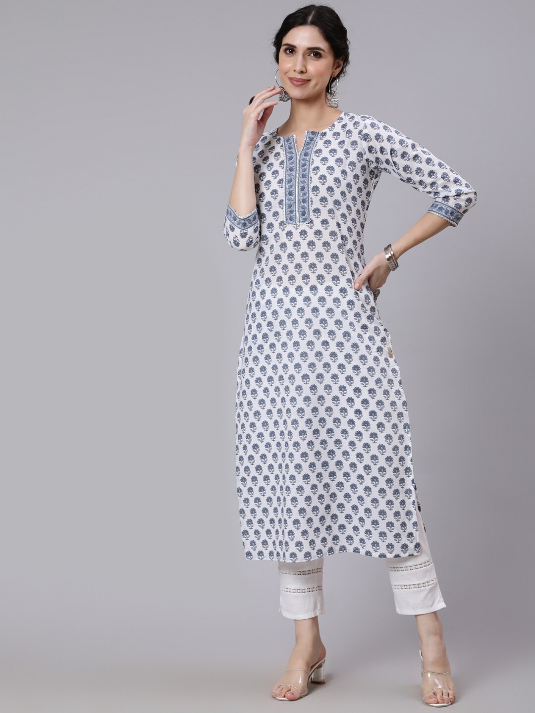 

Nayo Women Off-White Printed Straight Kurta With Three Quarter Sleeves
