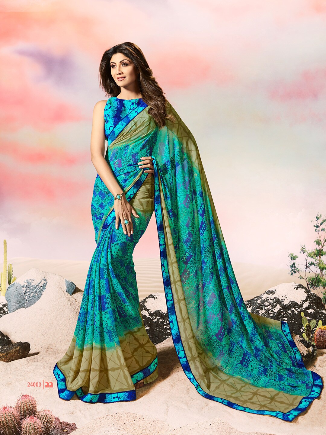 

Shaily Blue & Green Pure Georgette Printed Saree