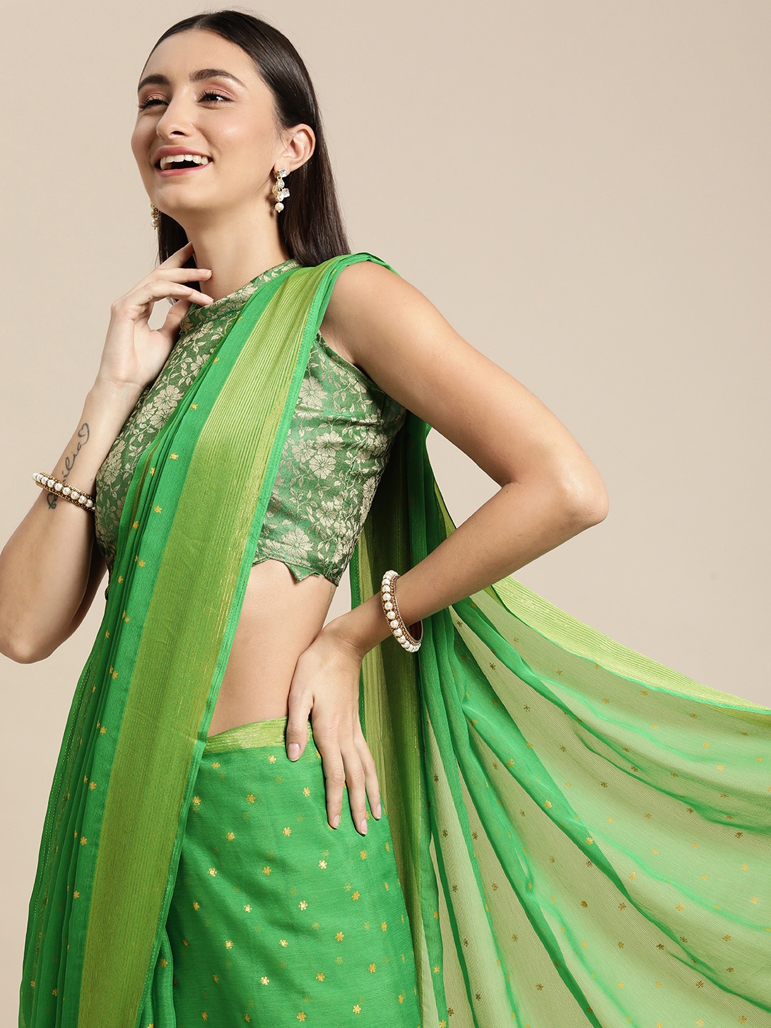 

Mitera Green Floral Pure Chiffon Saree