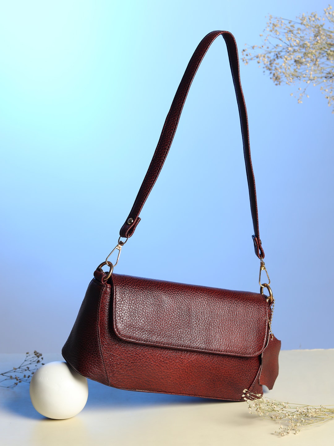 

AMYENCE Women Brown Textured Leather Swagger Sling Bag