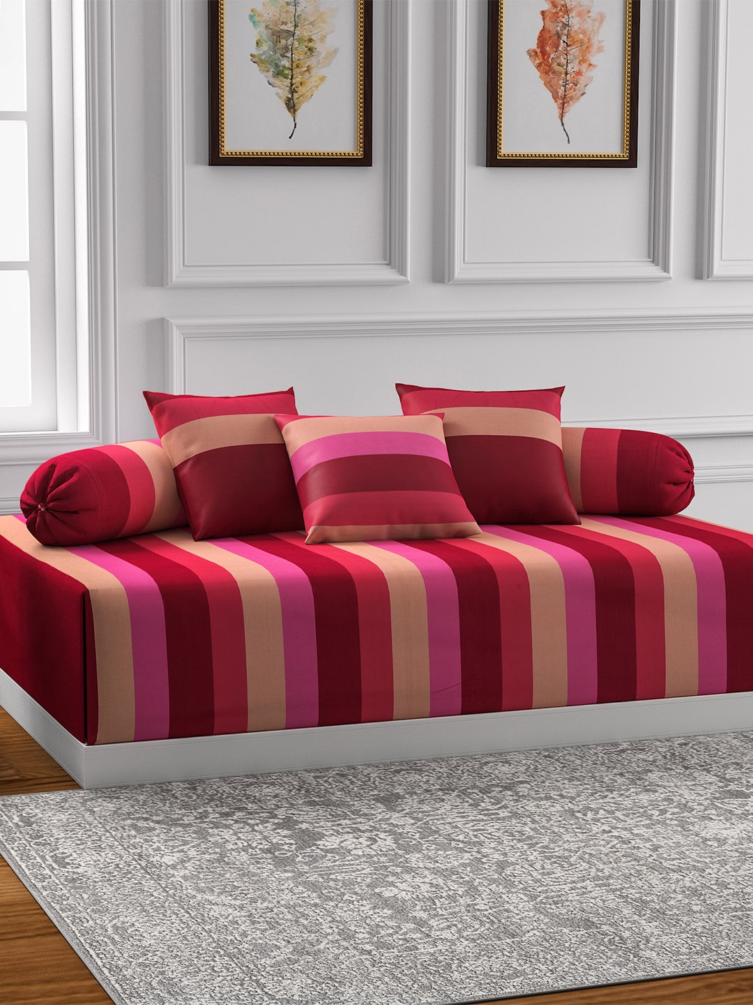 

Swayam Magenta & Beige Striped Diwan Set with Bolster and Cushion Covers