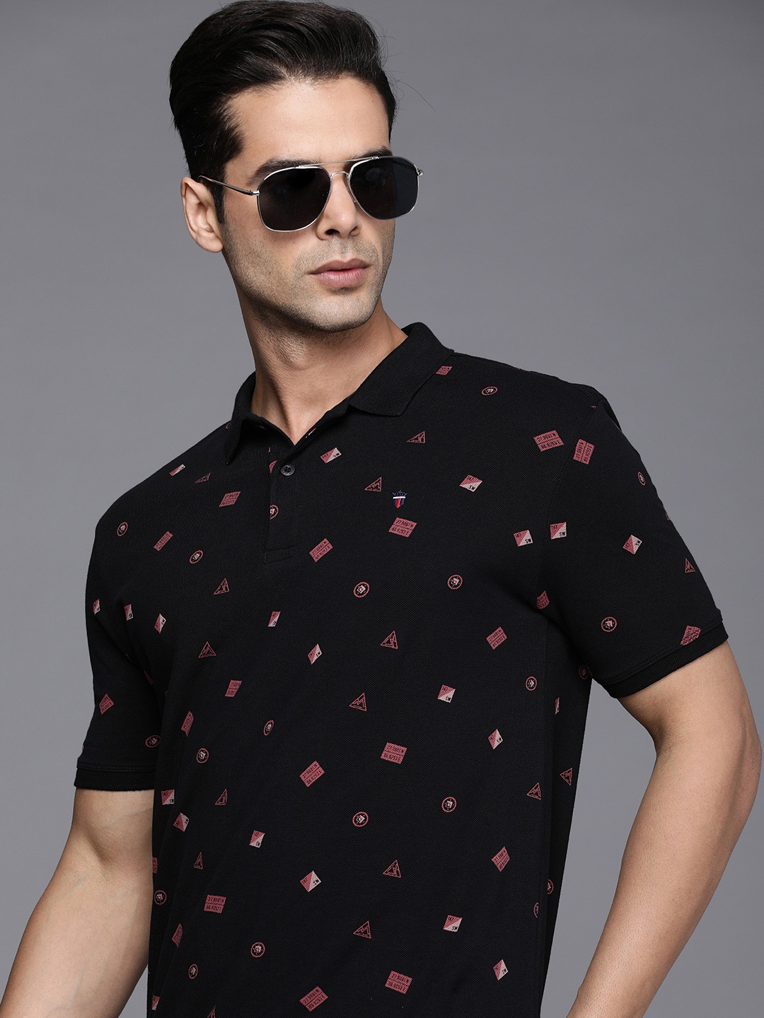 

Louis Philippe Jeans Men Black & Peach Geometruc Printed Pure Cotton Slim Fit Polo T-shirt