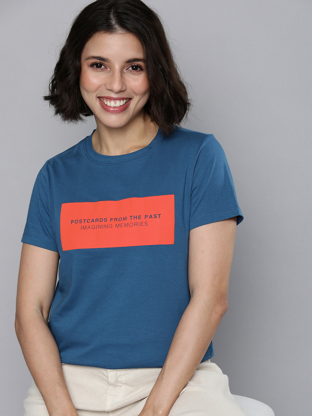 

Mast & Harbour Women Navy Blue & Orange Typography Printed Pure Cotton T-shirt