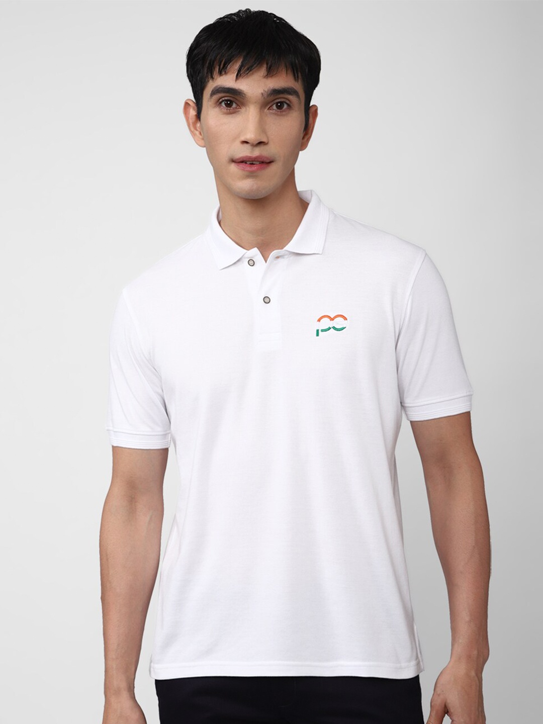 

Peter England Casuals Men White Solid Cotton Polo Collar T-shirt