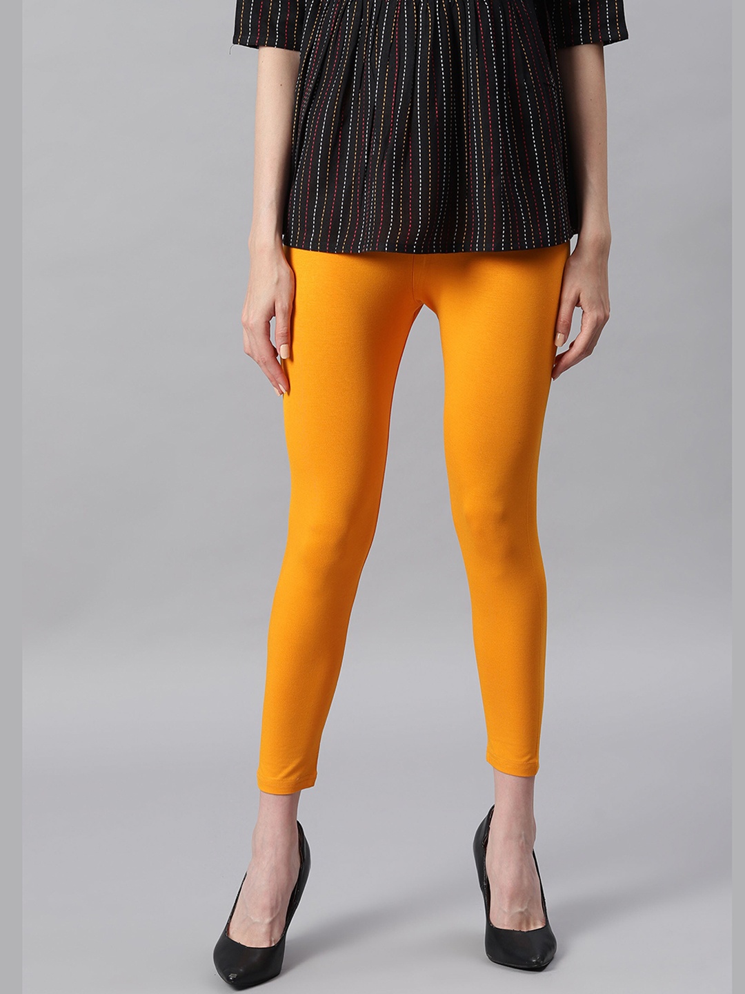 

Janasya Women Mustard Yellow Solid Ankle-Length Leggings