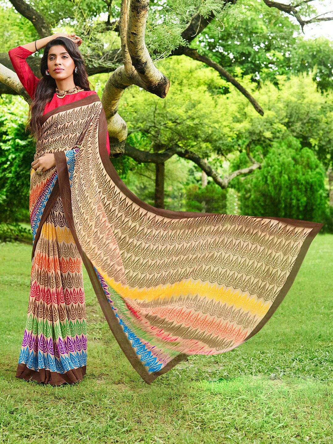 

Shaily Women Brown & Yellow Ethnic Motifs Printed Poly Georgette Saree