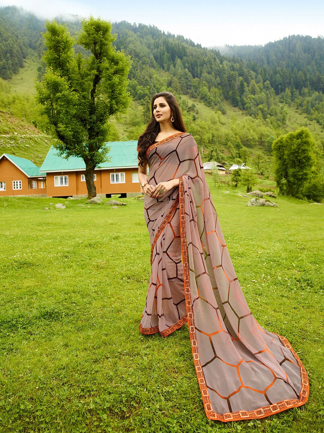 

Shaily Brown & Orange Geometric Printed Mirror Work Pure Georgette Saree