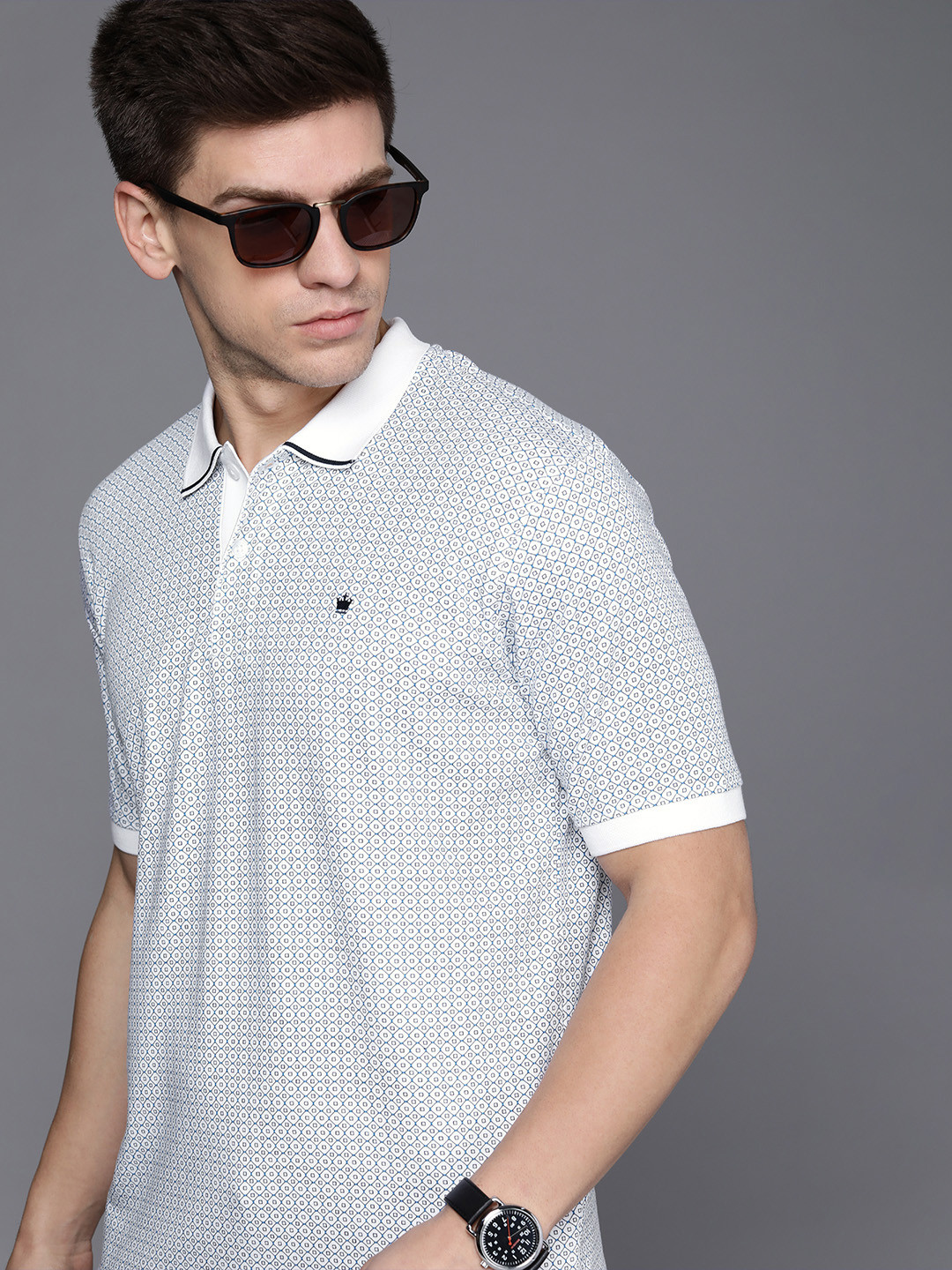 

Louis Philippe Men Blue & White Geometric Printed Polo Collar Pure Cotton T-shirt