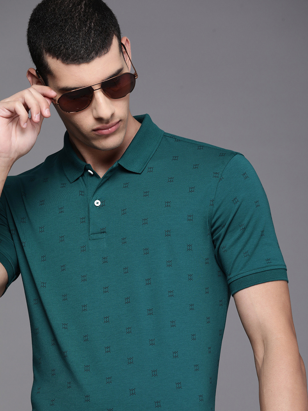 

Louis Philippe Ath Work Men Green Geometric Printed Polo Collar Slim Fit T-shirt