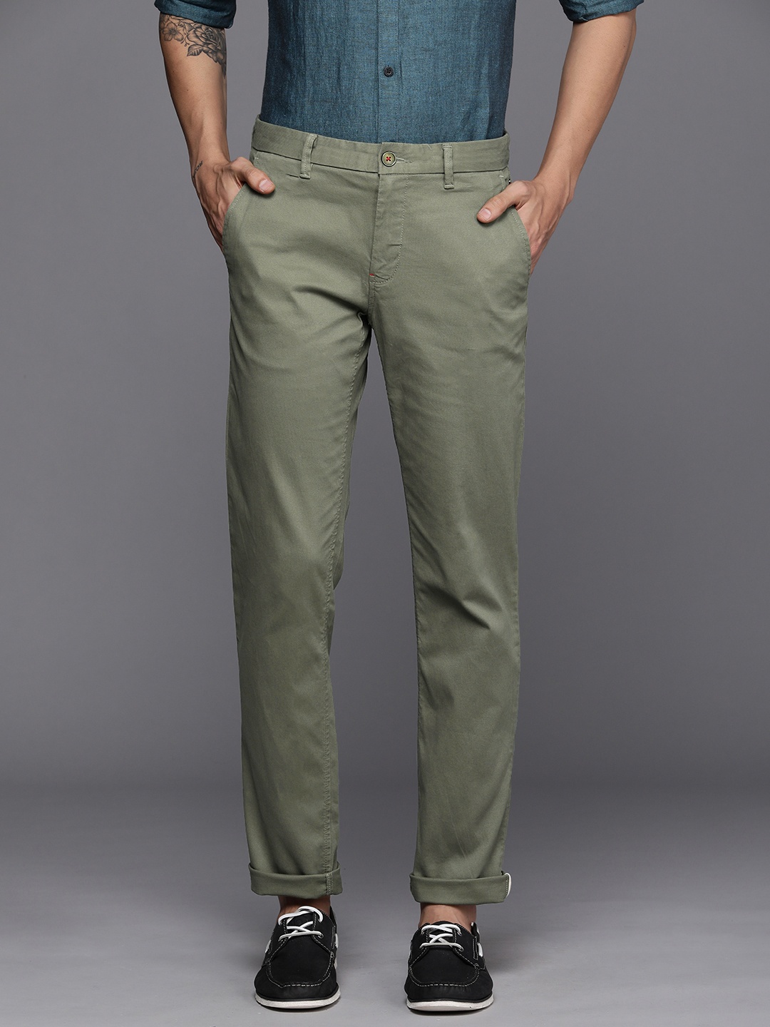 

Louis Philippe Sport Men Olive Green Textured Tapered Fit Trousers