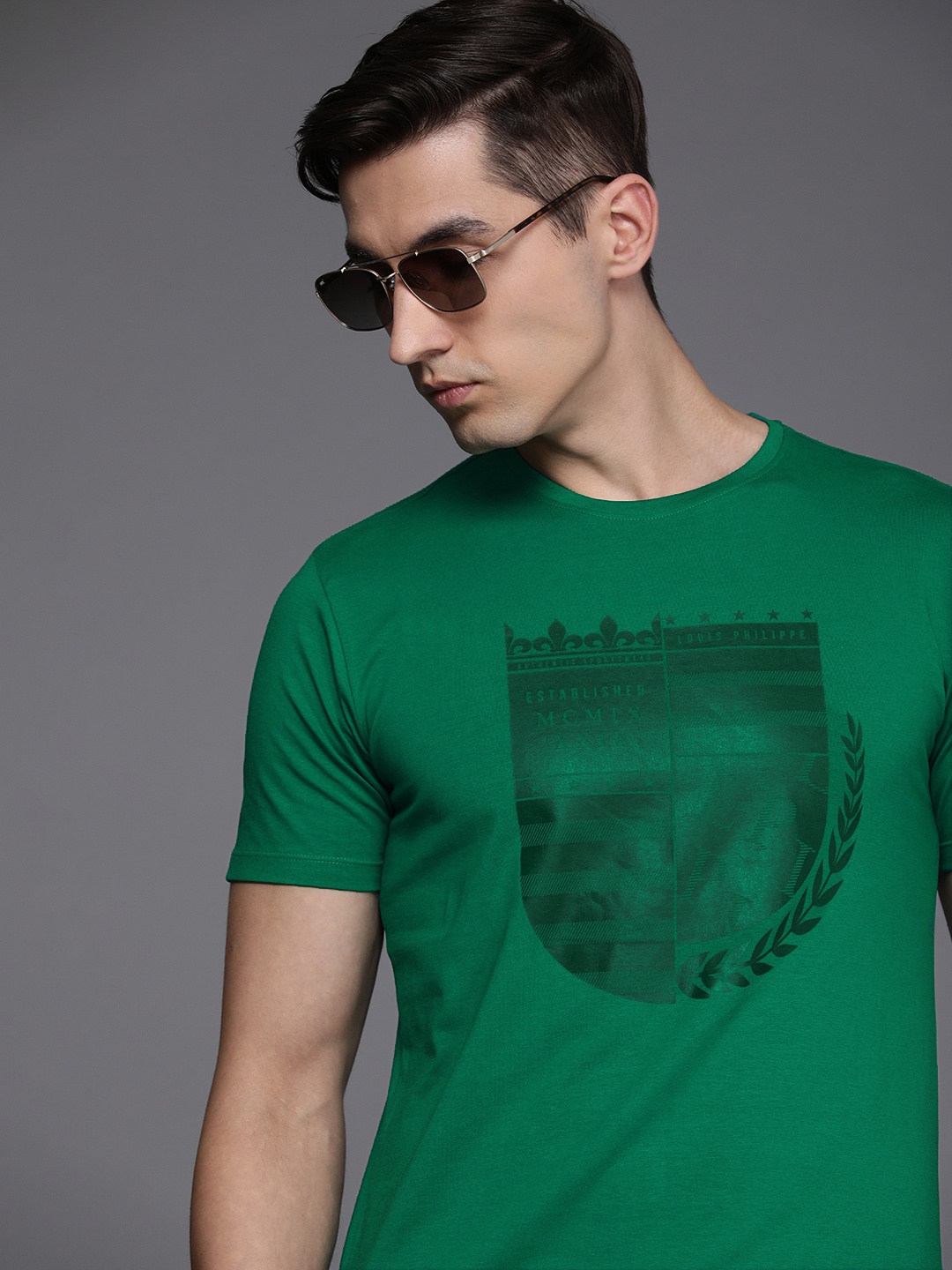 

Louis Philippe Sport Men Green Brand Logo Print Round Neck Slim Fit Knitted T-shirt