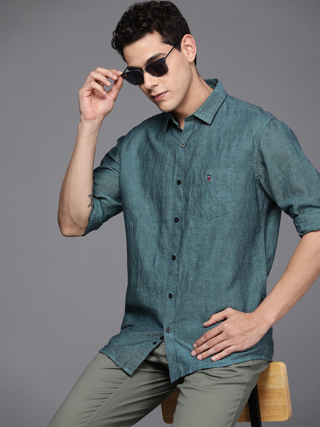 

Louis Philippe Sport Men Teal Green Solid Slim Fit Casual Shirt