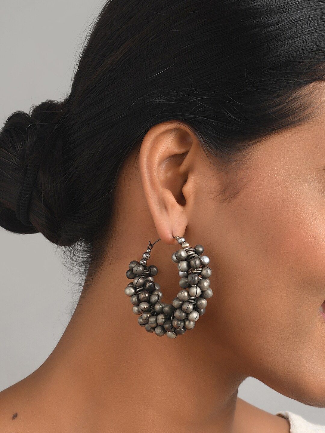 

Fida Silver-Toned Contemporary Half Hoop Earrings
