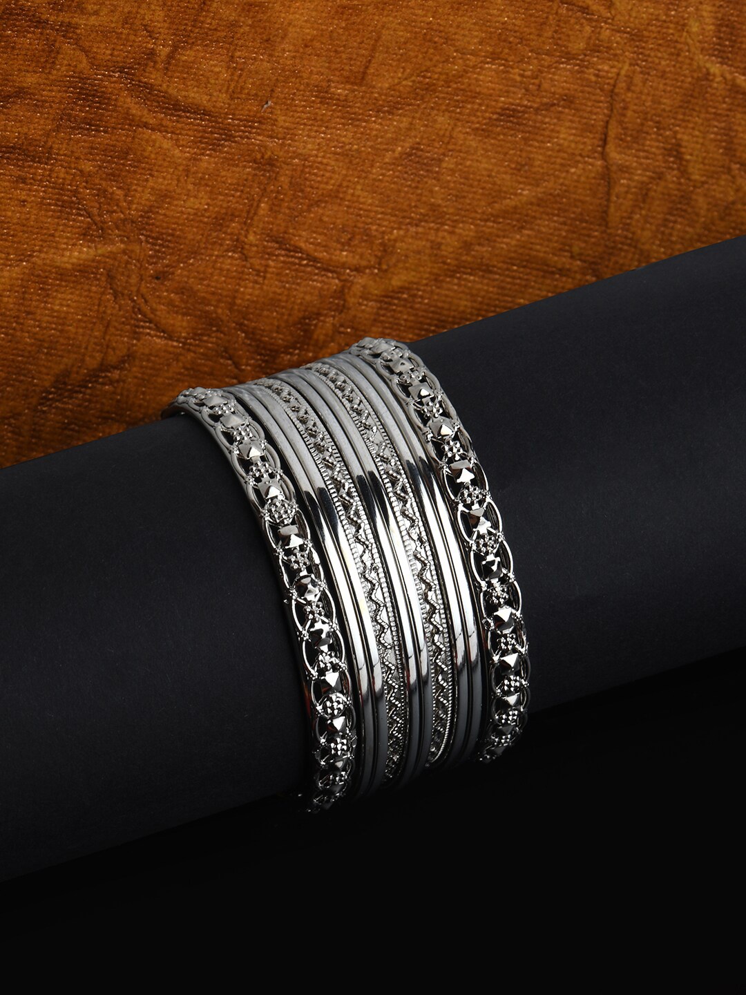 

Fida Women Silver-Plated Floral Bangles
