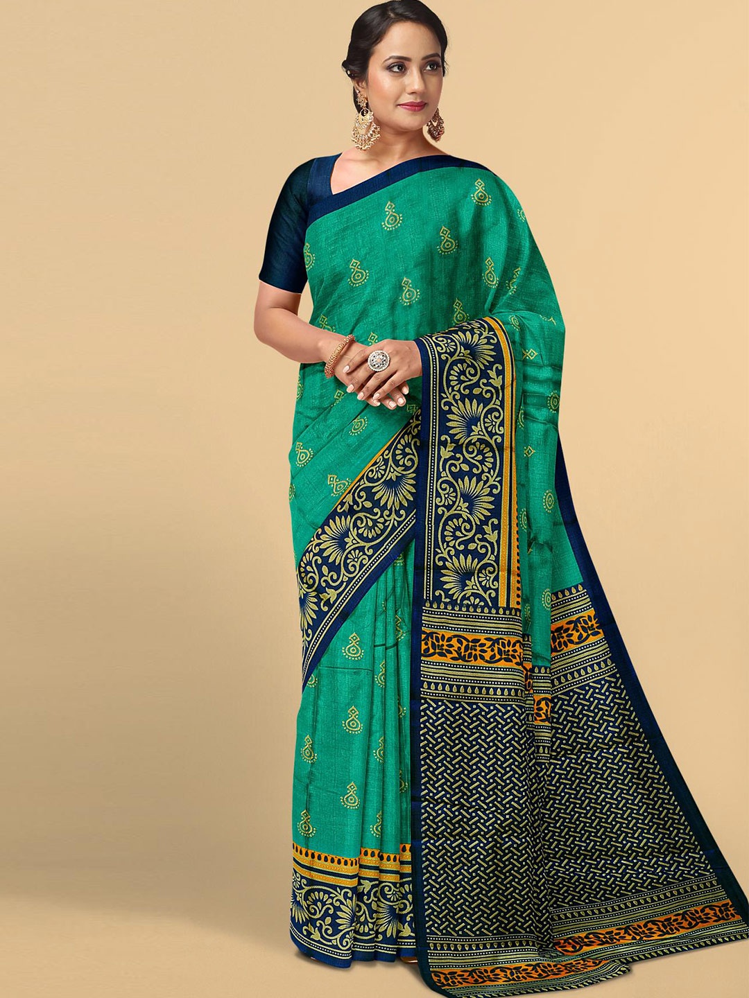 

Kalamandir Teal & Navy Blue Ethnic Motifs Silk Blend Saree