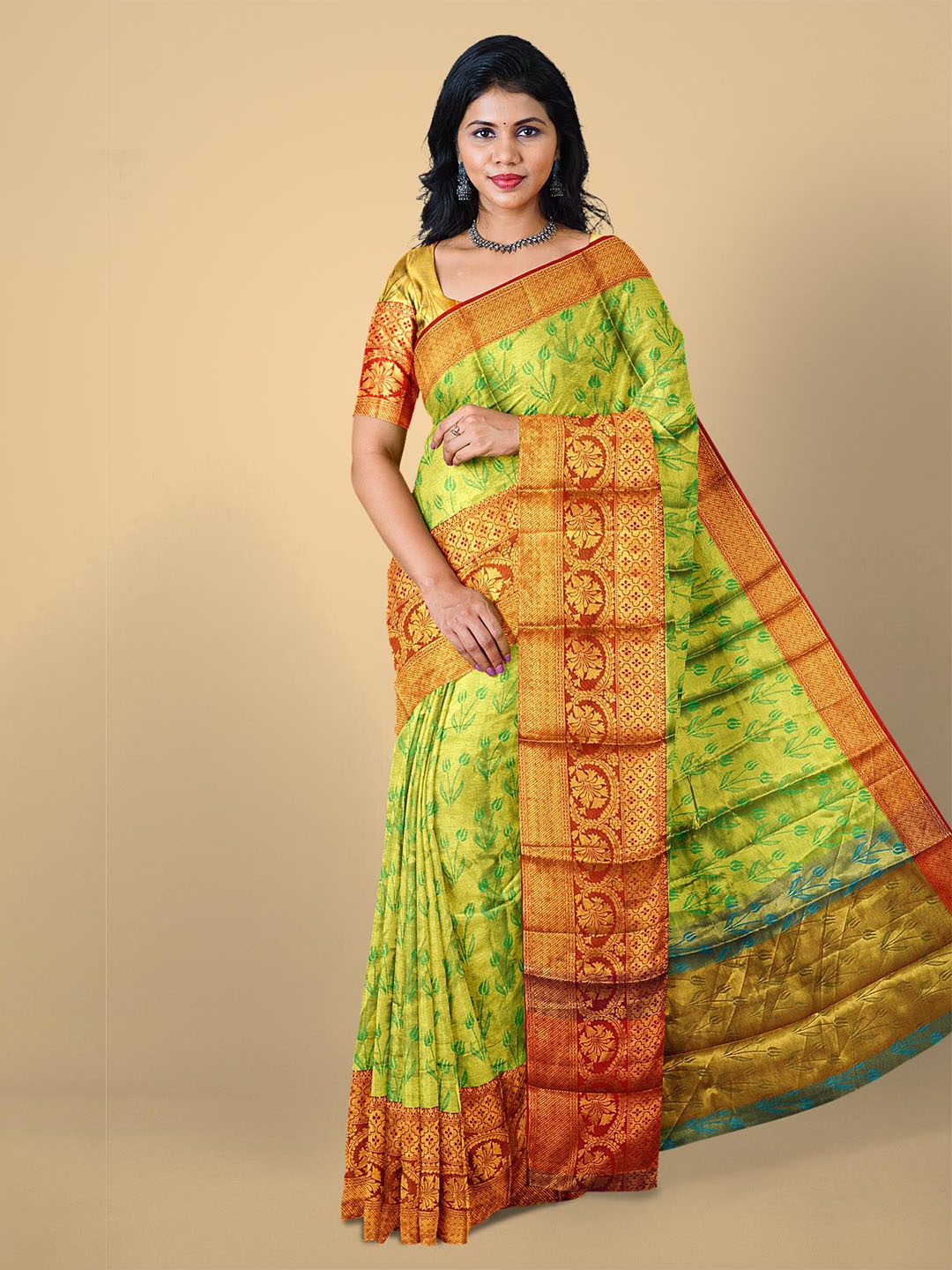 

Kalamandir Green & Orange Floral Zari Silk Blend Saree