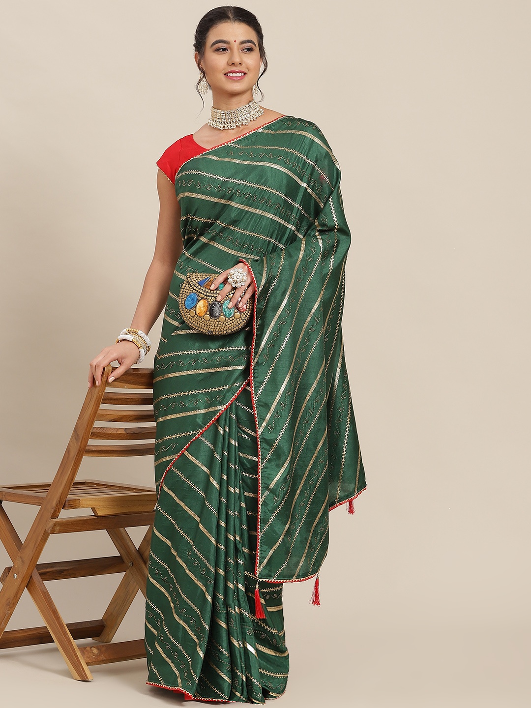 

SAARYA Green & Red Ethnic Motifs Saree