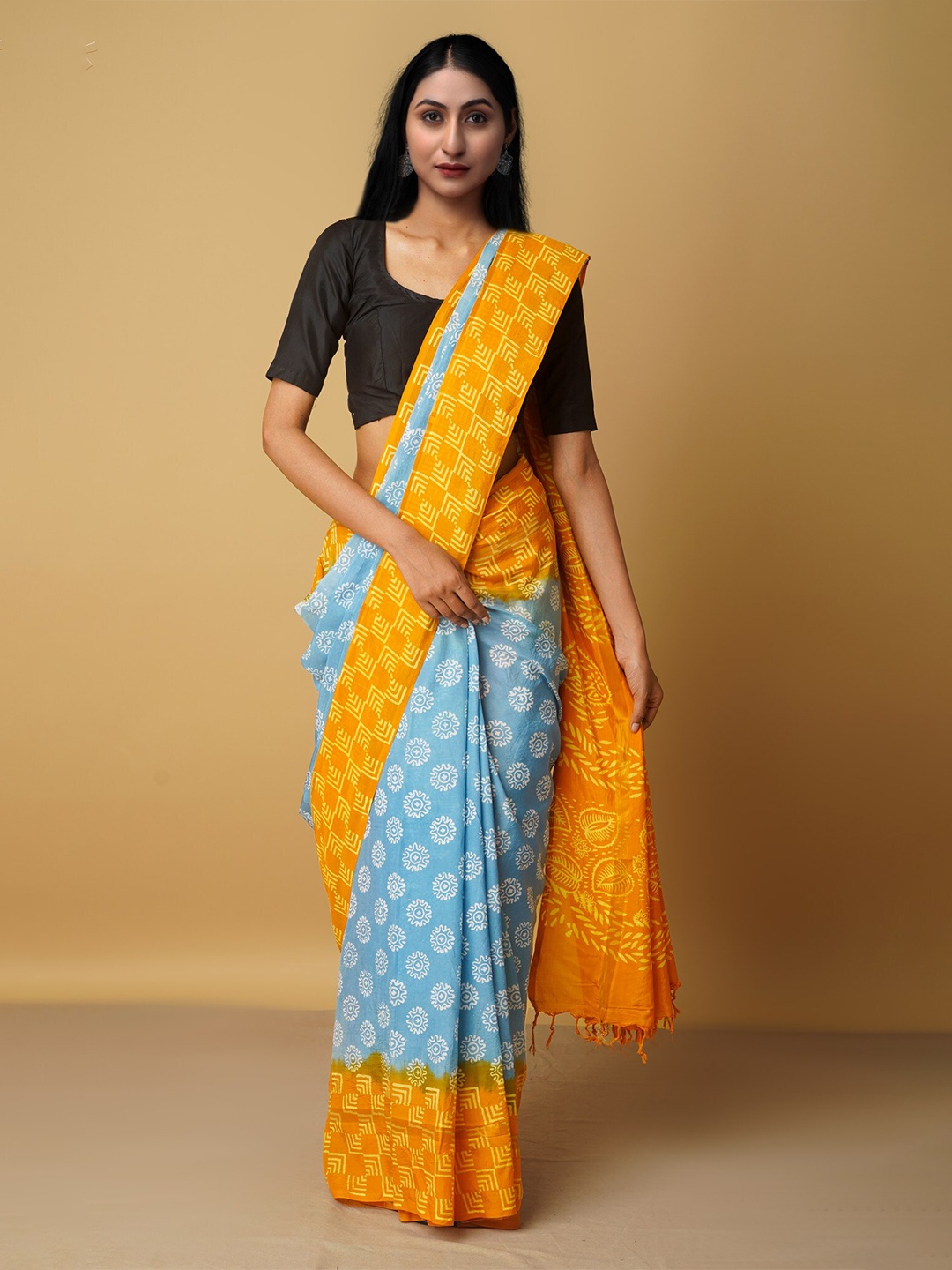 

Unnati Silks Blue & Orange Ethnic Motifs Silk Blend Baluchari Saree