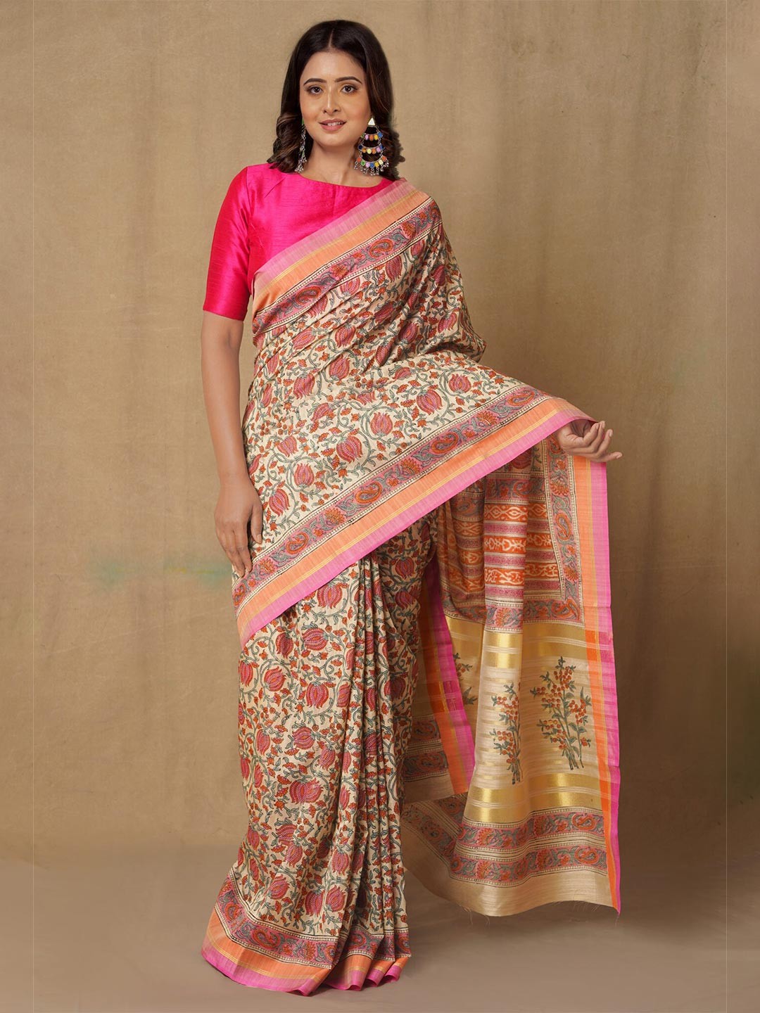 

Unnati Silks Brown & Green Floral Silk Blend Tussar Saree