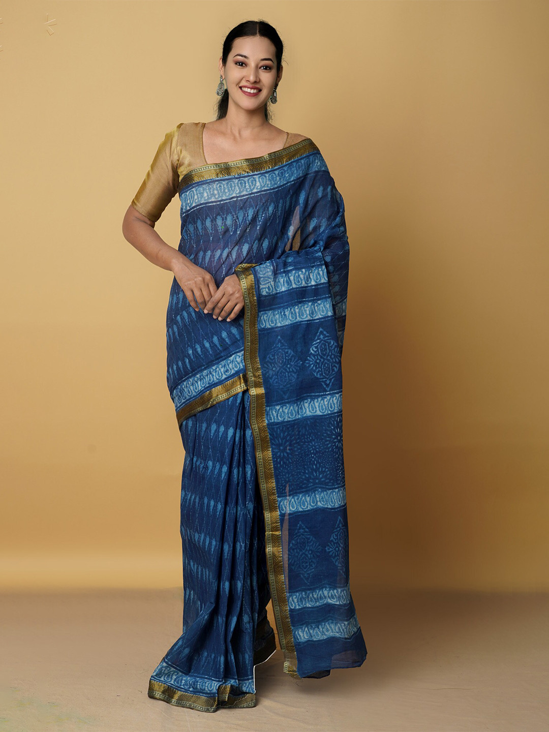 

Unnati Silks Navy Blue & Gold-Toned Ethnic Motifs Zari Pure Cotton Saree