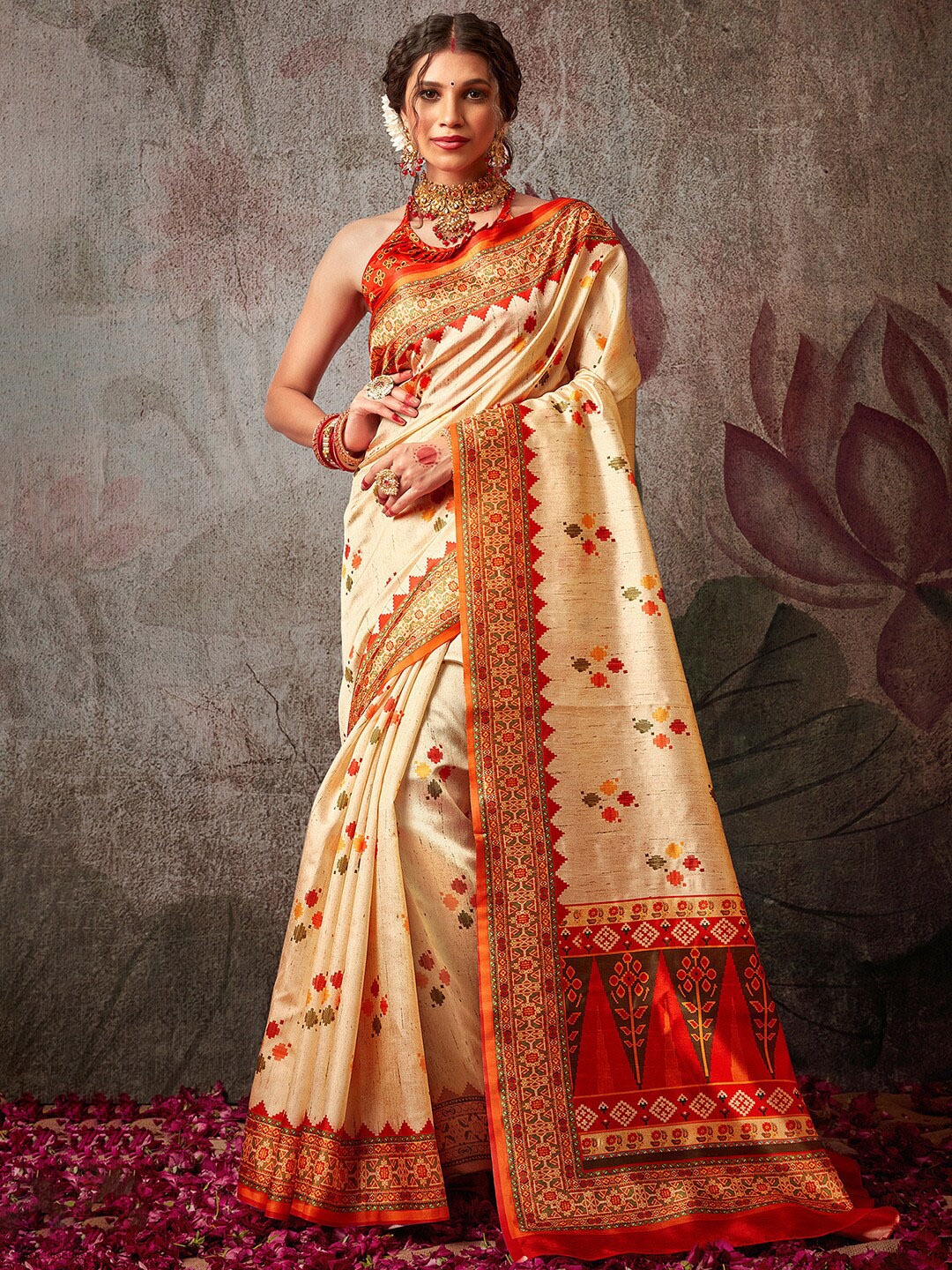 

Mitera Off White & Orange Silk Blend Sambalpuri Saree