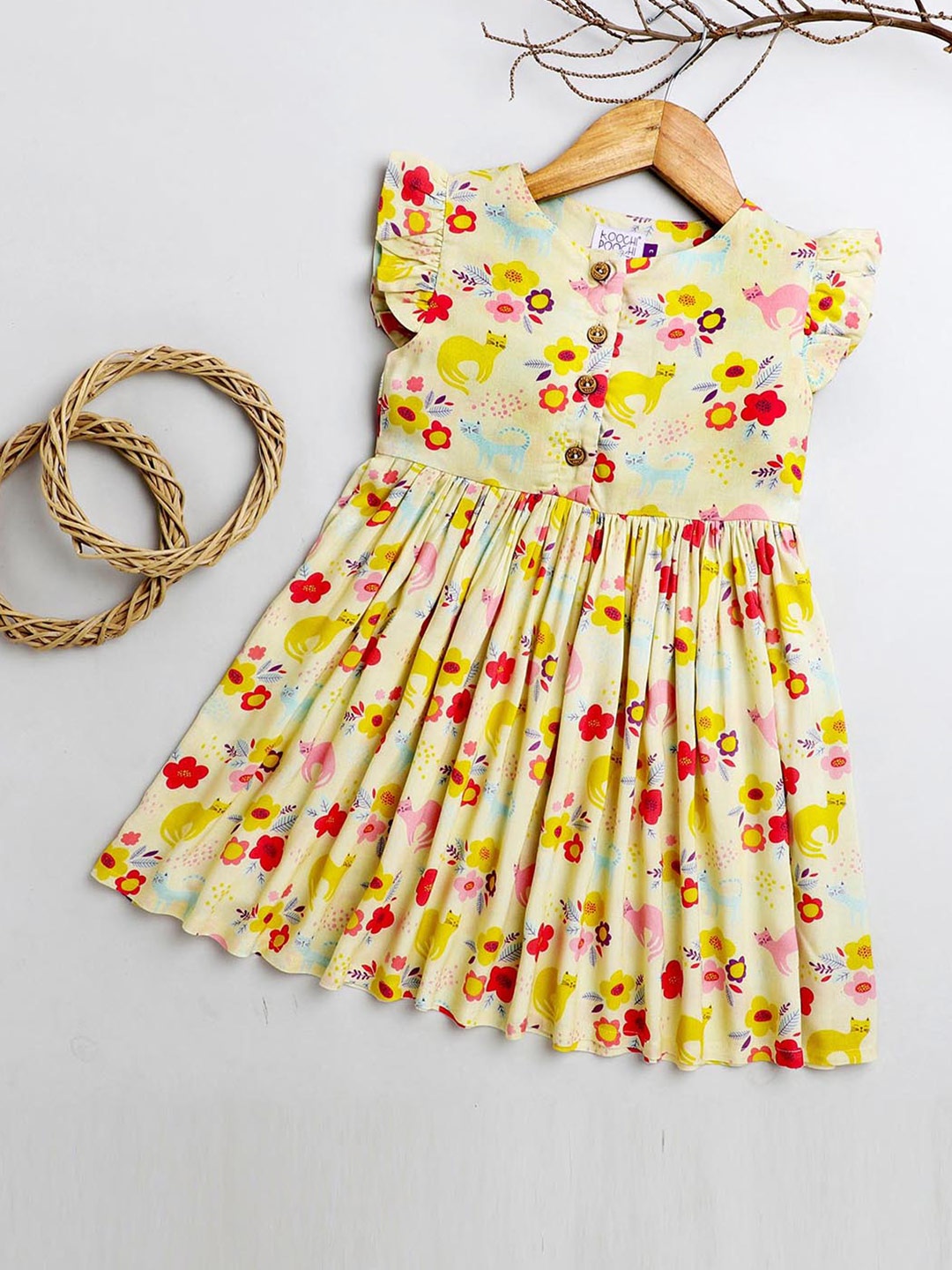 

KOOCHI POOCHI Yellow Peplum Dress