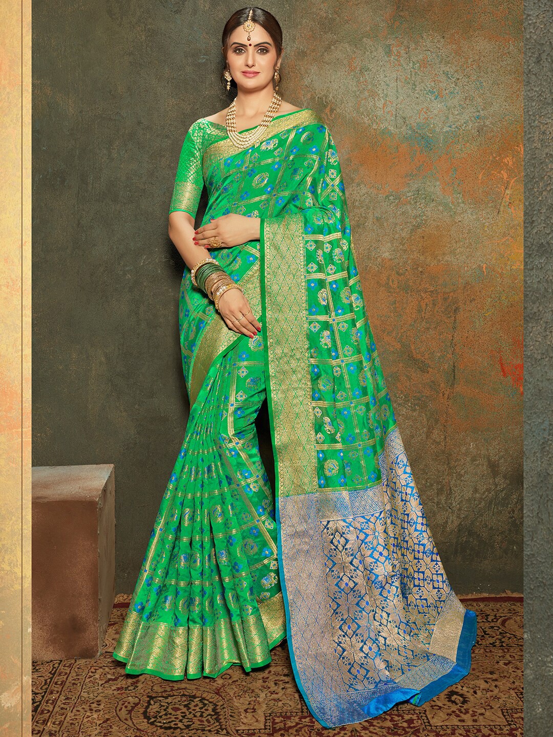 

Shaily Green & Blue Woven Design Zari Silk Blend Patola Saree