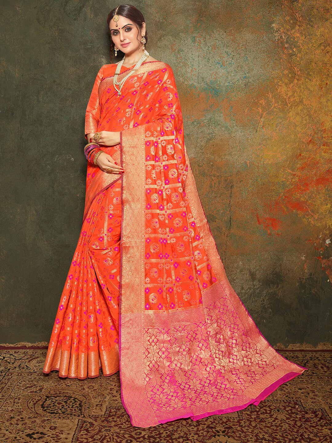 

Shaily Orange & Gold-Toned Woven Design Zari Silk Blend Patola Saree