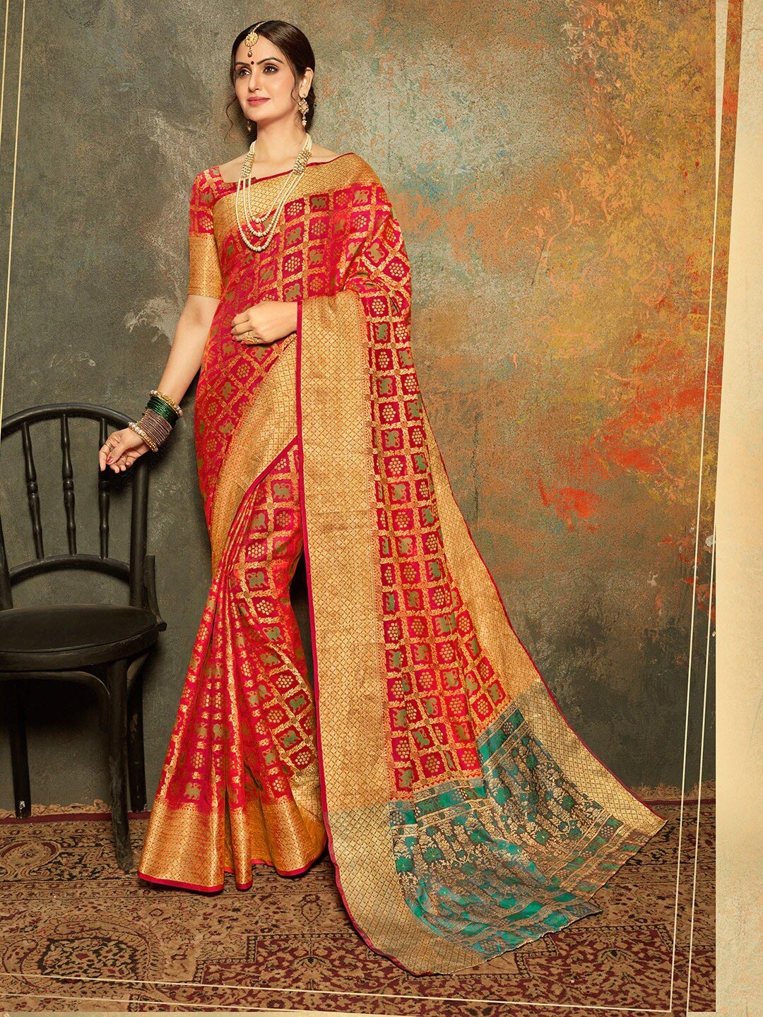 

Shaily Red & Blue Woven Design Zari Silk Blend Patola Saree