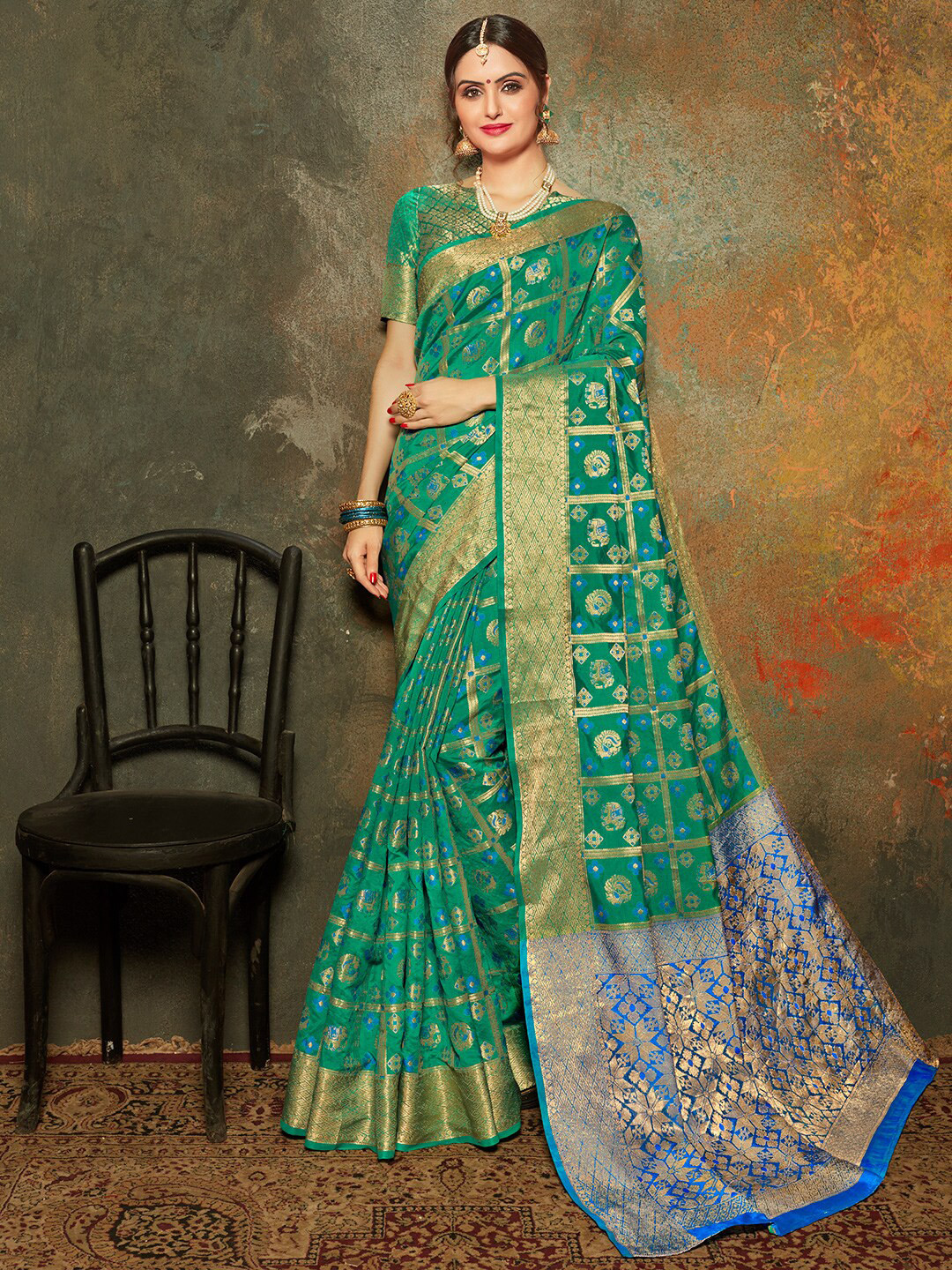 

Shaily Turquoise Blue & Blue Woven Design Zari Silk Blend Patola Saree
