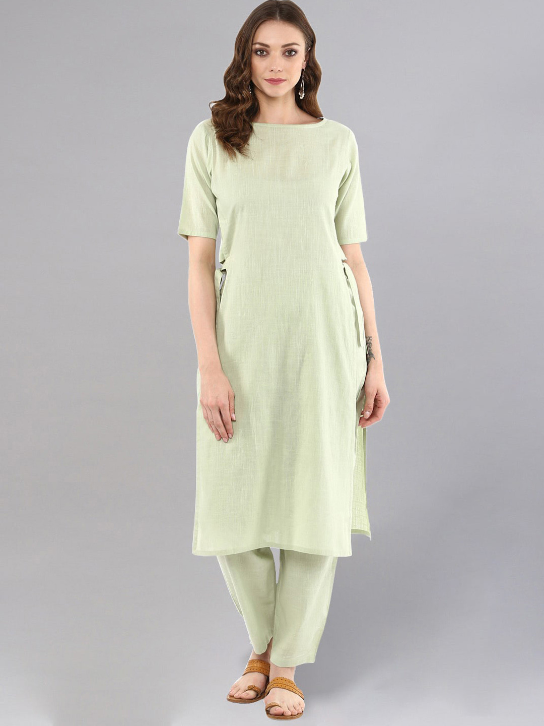 

Idalia Women Green High Slit Kurta with Trousers