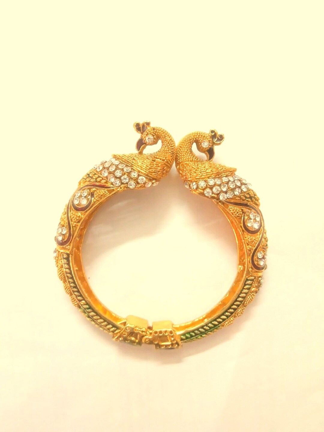 

Runjhun Gold-Plated & Toned White CZ studded Traditional Bangle