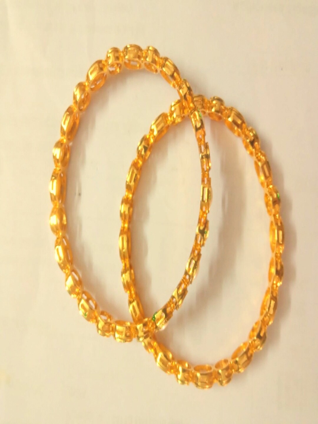 

Runjhun Gold-Plated & Green Traditional Bracelet Bangles