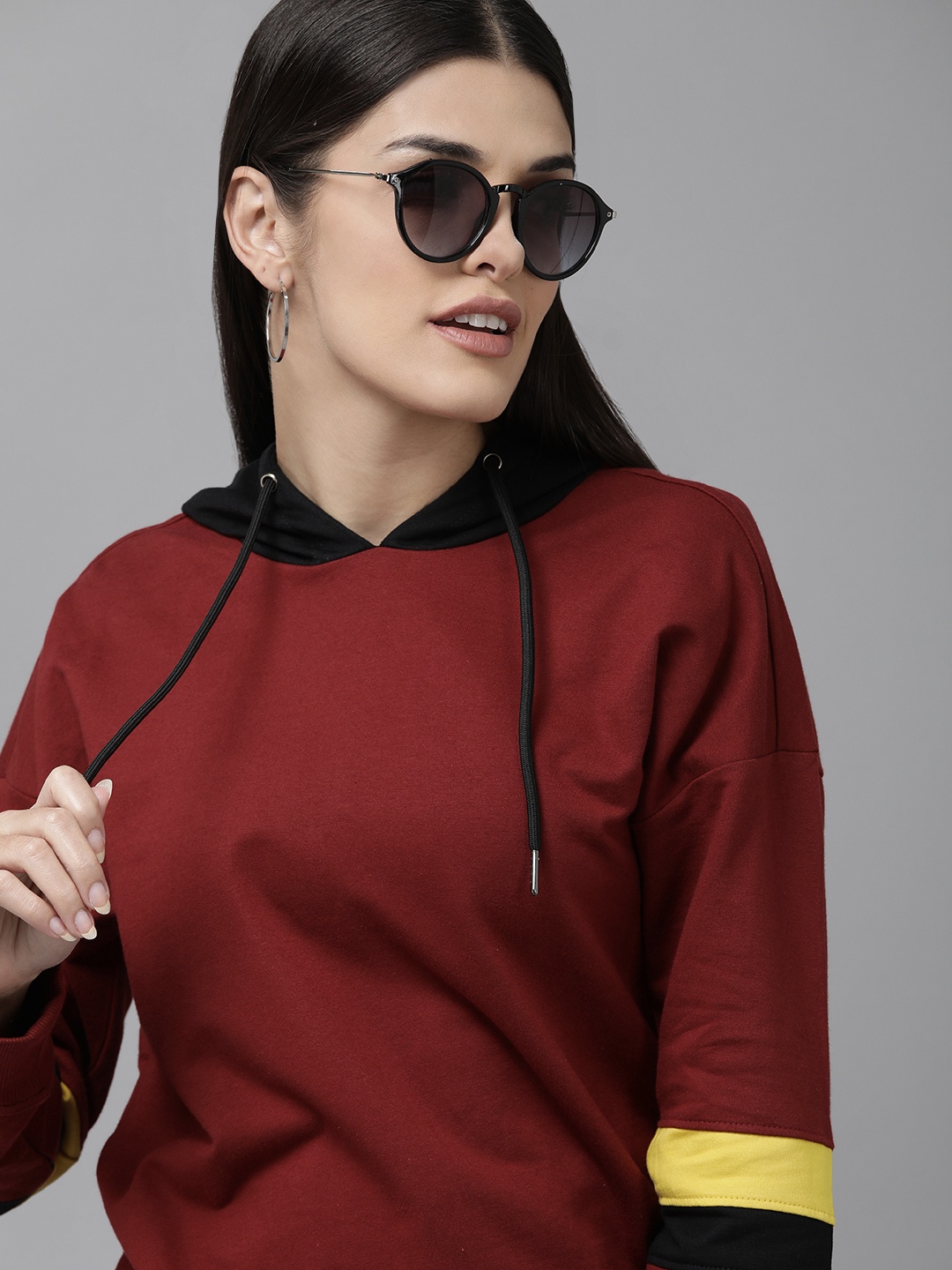 

Van Heusen Women Maroon Solid Hooded Pure Cotton Sweatshirt