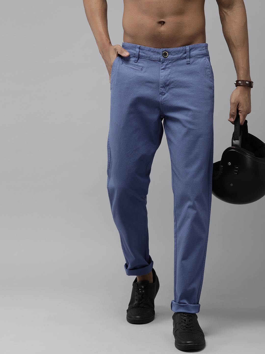 

The Roadster Lifestyle Co Men Blue Textured Mid-Rise Regular Trousers