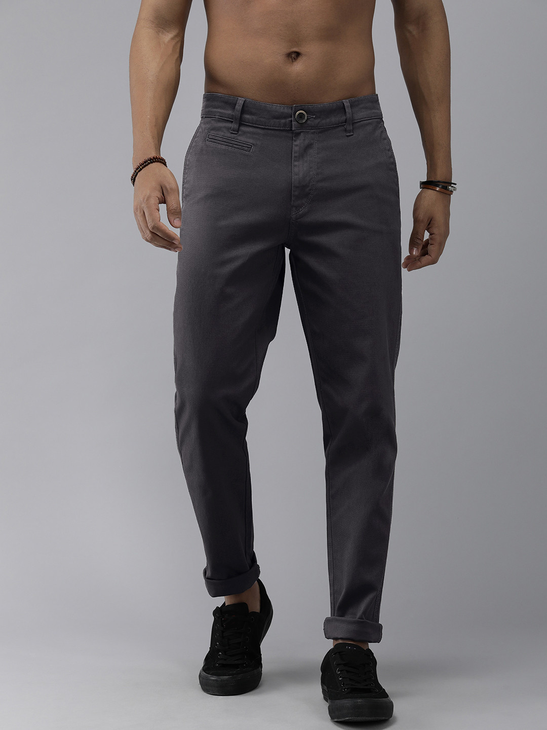 

Roadster Men Black Textured Slim Fit Trousers