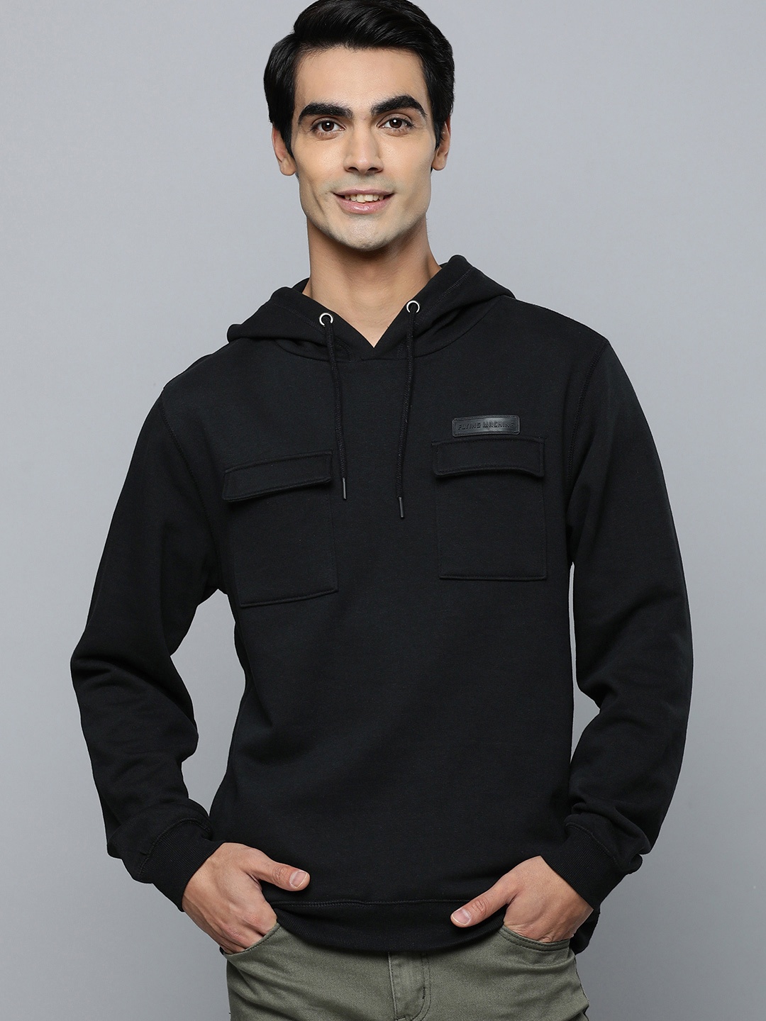 

Flying Machine Men Black Solid Hooded Sweatshirt