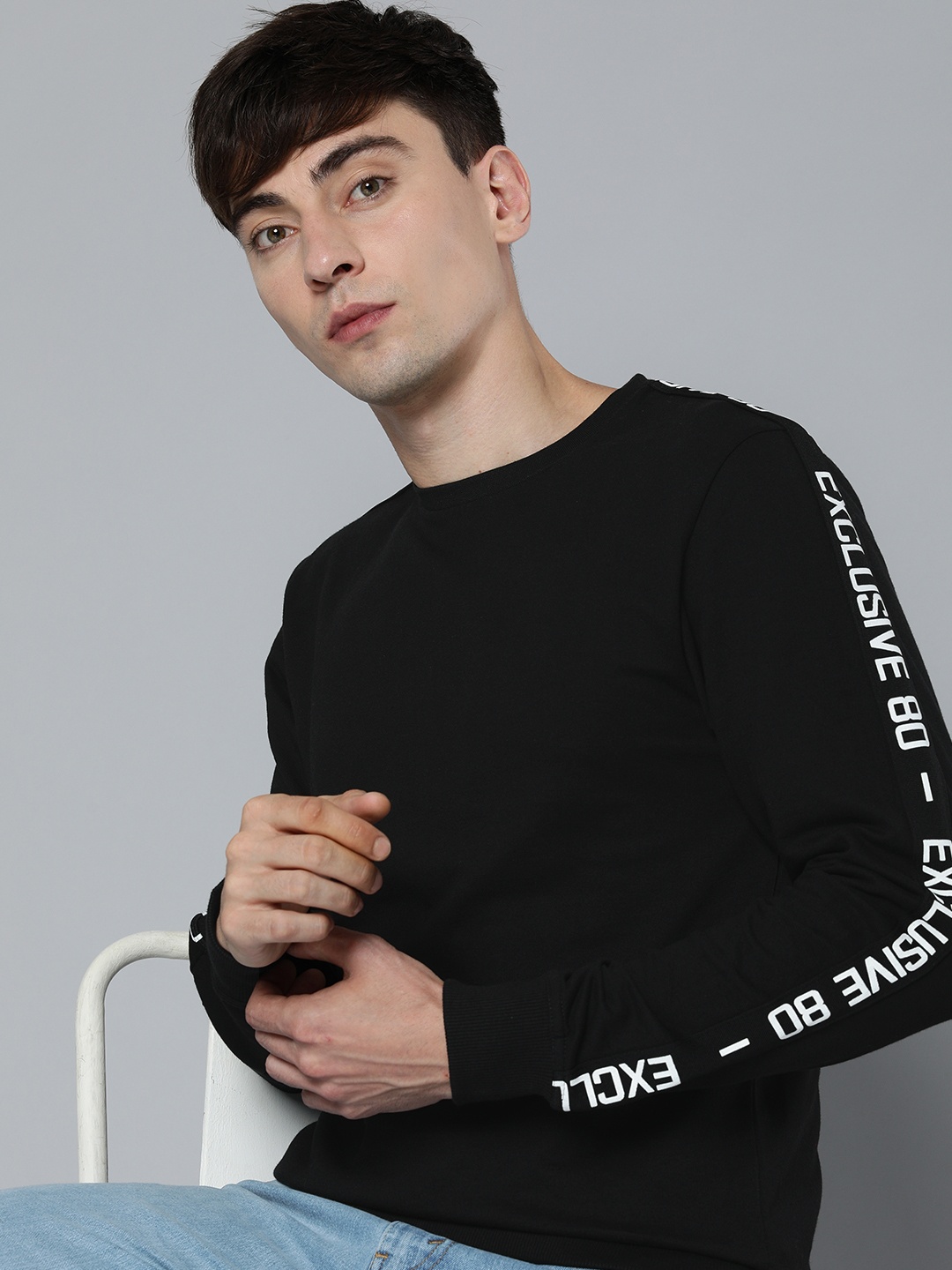 

Flying Machine Men Black Solid Sweatshirt