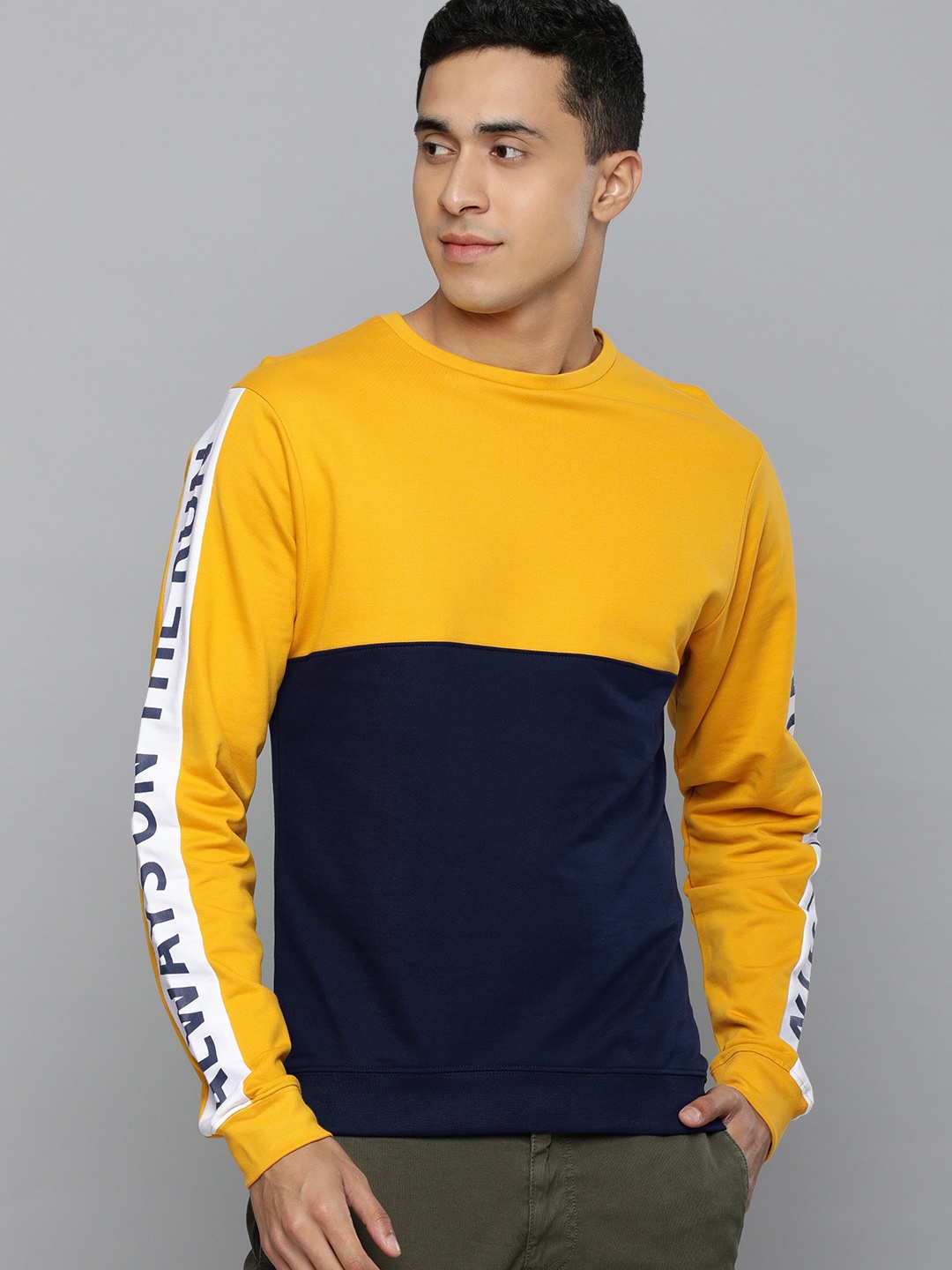 

Flying Machine Men Yellow & Black Colourblocked Sweatshirt