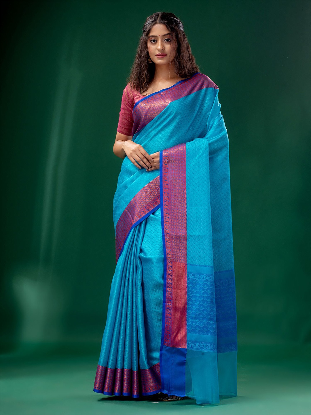 

Charukriti Blue & Pink Woven Design Zari Organza Saree