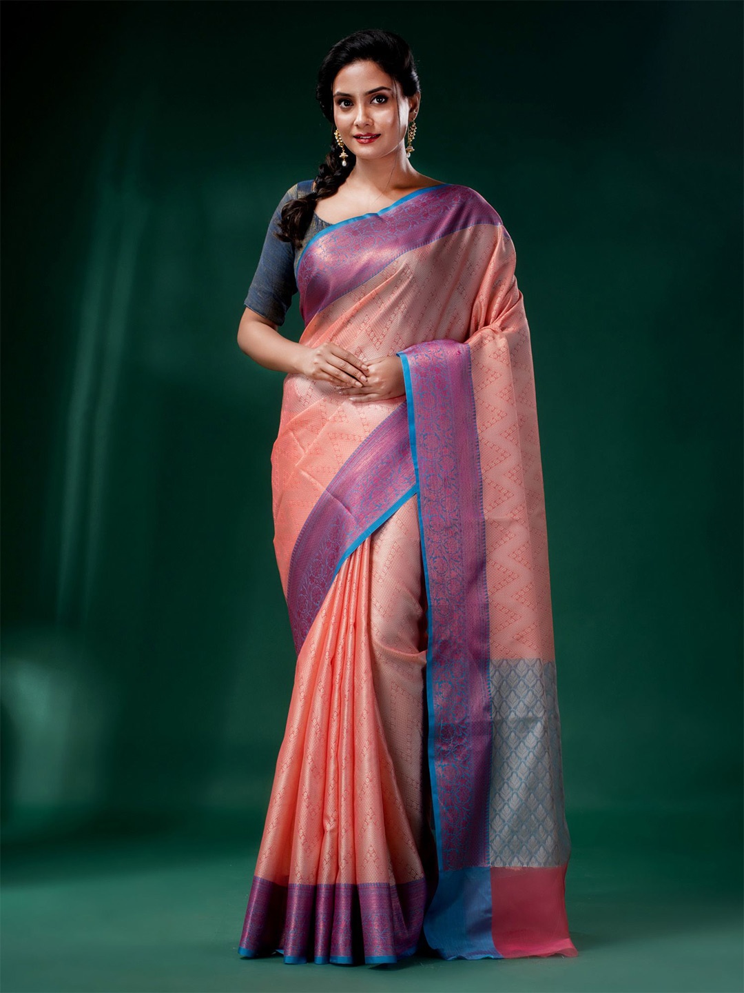 

Charukriti Orange & Pink Woven Design Zari Organza Saree