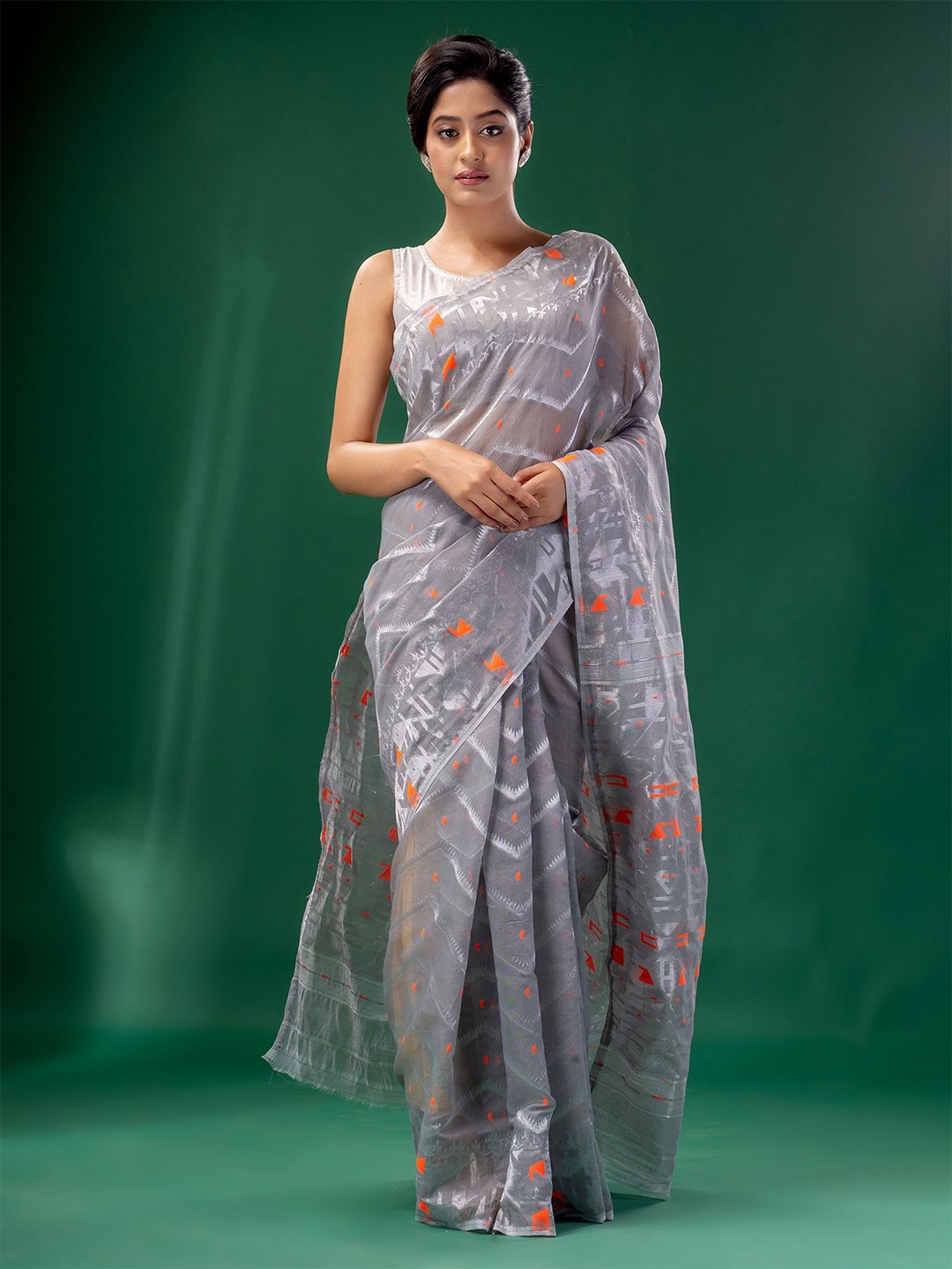 

Charukriti Grey & Orange Woven Design Zari Silk Cotton Jamdani Saree