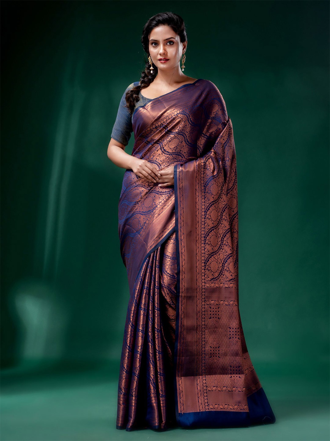

Charukriti Blue & Gold-Toned Ethnic Motifs Zari Brocade Saree