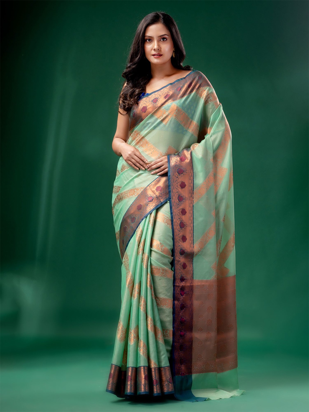 

Charukriti Green & Gold-Toned Woven Design Zari Silk Cotton Saree