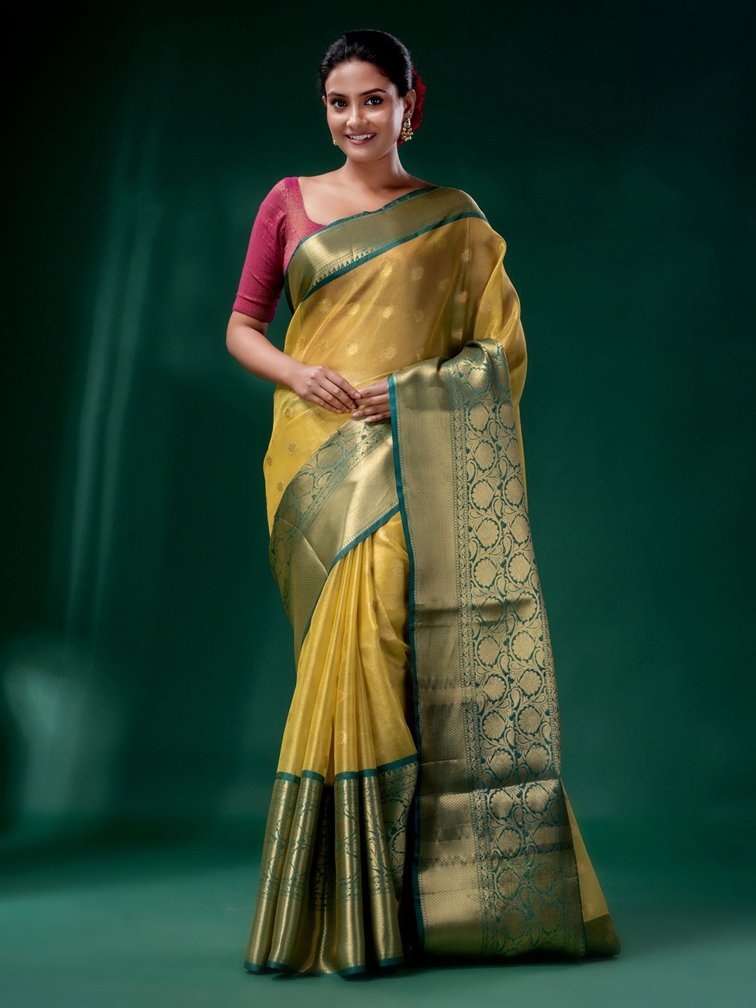 

Charukriti Women Yellow & Green Ethnic Motifs Zari Tissue Saree