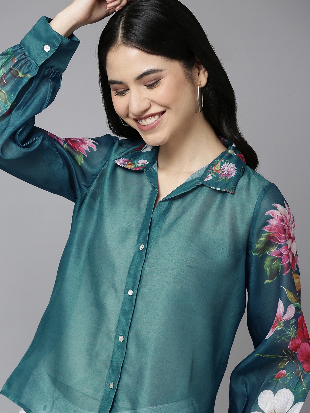 

Bhama Couture Women Teal Blue Floral Detail Shirt Style Top
