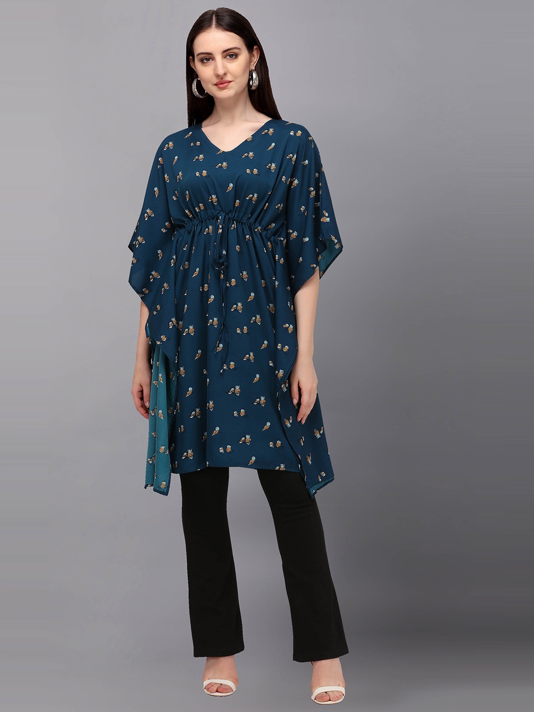 

Fashfun Women Teal & White Ethnic Motifs Printed Flared Sleeves Kaftan Kurta