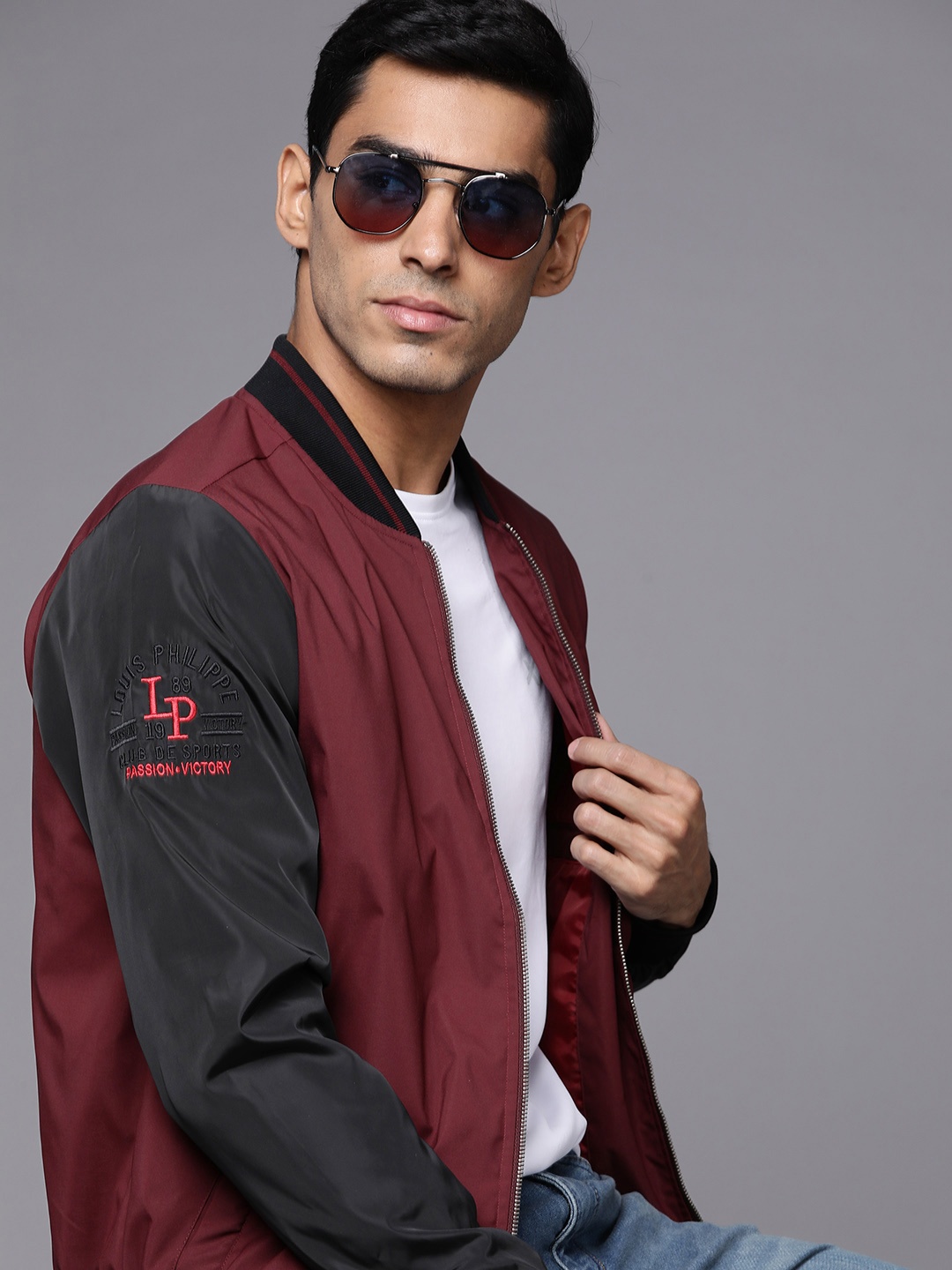 

Louis Philippe Sport Men Maroon & Black Solid Varsity Jacket with Embroidered Logo